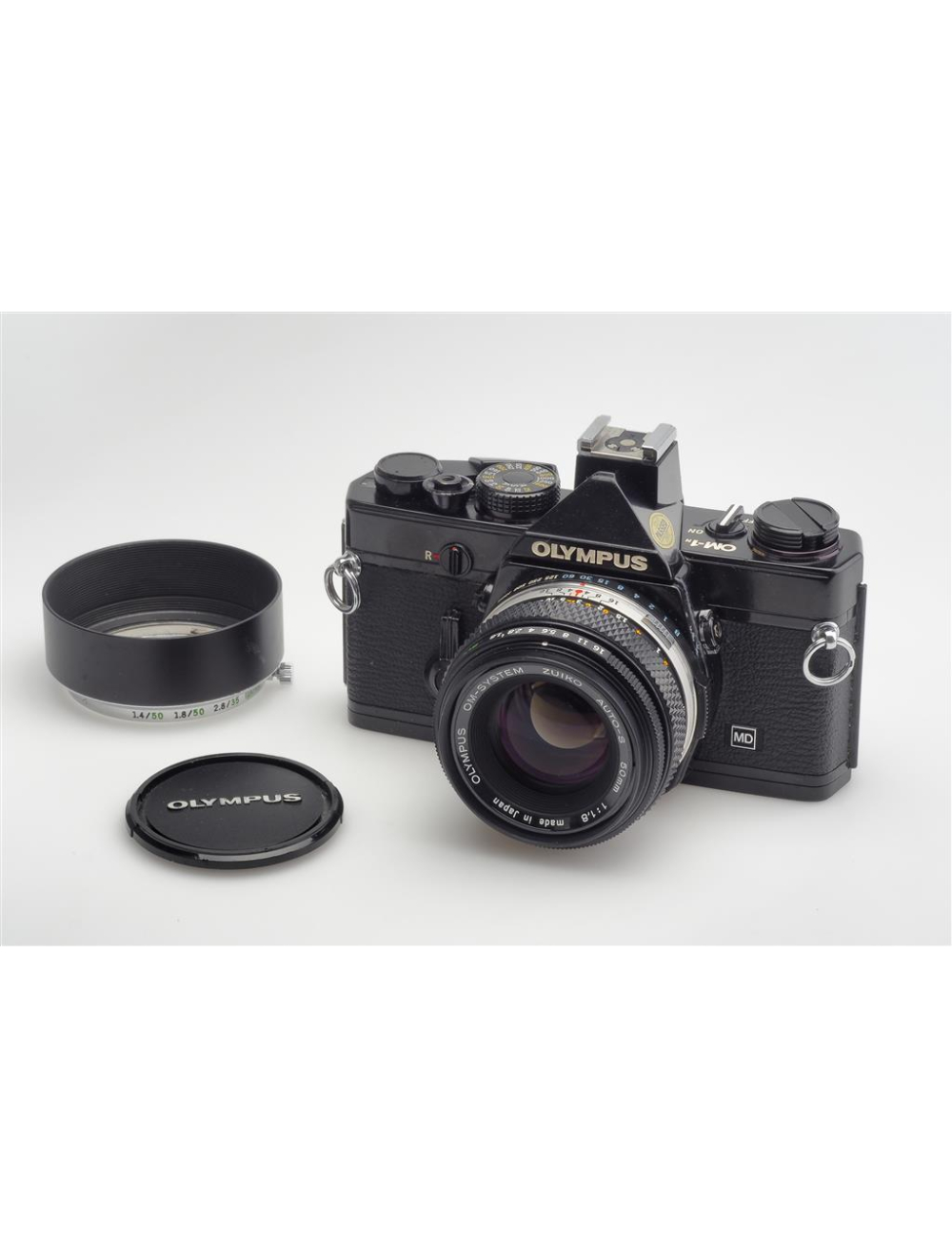 Olympus OM-1n Black w. 1.8/50mm Zuiko Auto-S & Hood | JO GEIER
