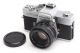 2110000858674_29263_1_minolta_srt_303b_chrome__w_1750mm_mc_rokkor-pf_567456af.jpg