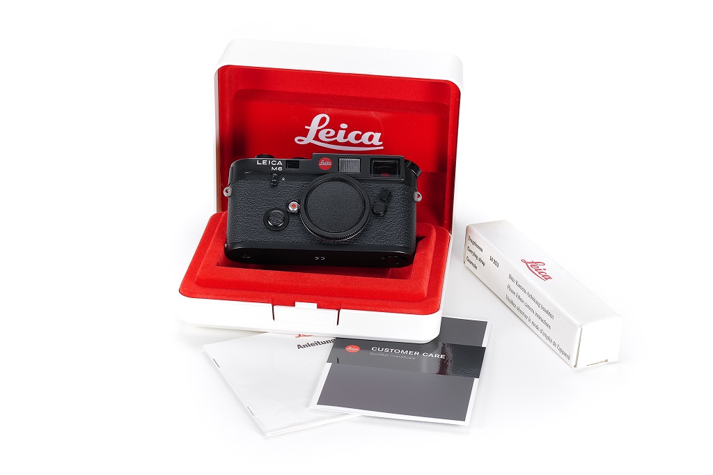 Black Leica M6 body with front cap in original presetation box with manual and strap in makers box